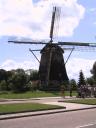 skaters by windmill, near Amsterdam