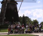 skaters by windmill, near Amsterdam